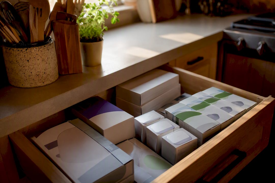 Sealed diabetic supplies stacked on shelf