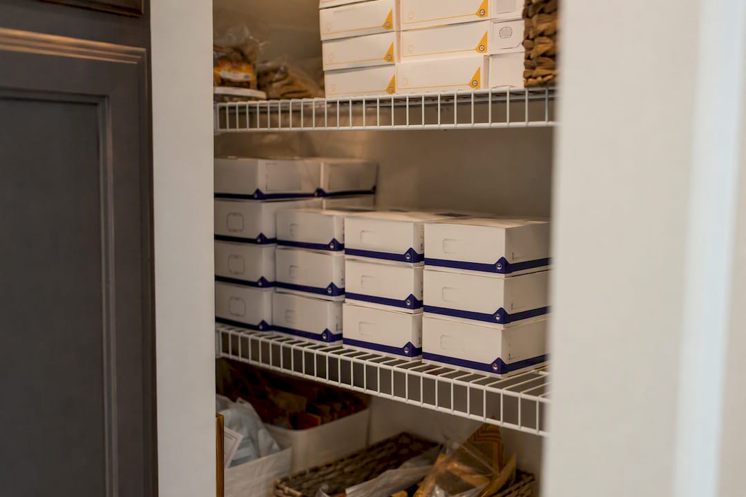 Sealed diabetic supply boxes stacked on shelf